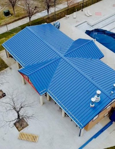 blue metal roof installed by rize exteriors, professional roofers in lakewood co