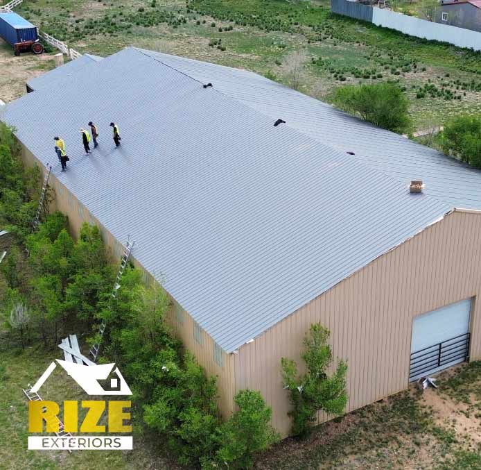 commercial-metal-roof Commercial building with newly installed metal roofing for enhanced weather resistance in Lakewood